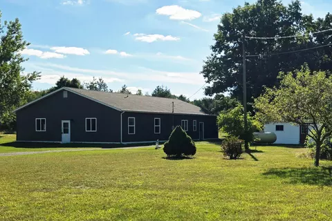 Exterior - 828 S Wicker Rd SE, Stanton, MI 48888 photo 2 of 6