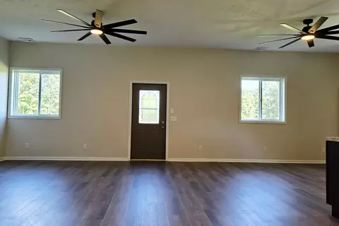 Living - 828 S Wicker Rd SE, Stanton, MI 48888 photo 3 of 5