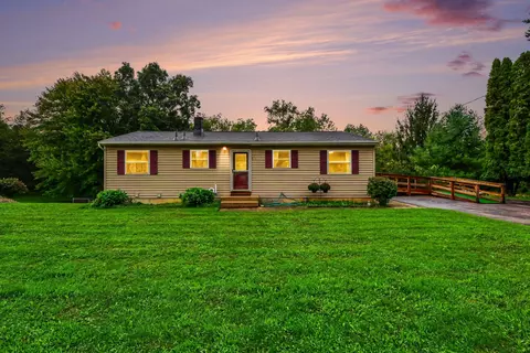Exterior - 893 Maplehill Ave SE, Ada, MI 49301 photo 2 of 5