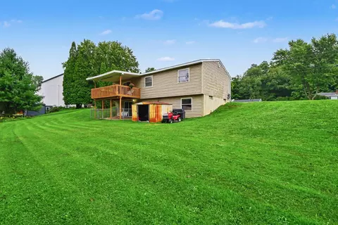 Exterior - 893 Maplehill Ave SE, Ada, MI 49301 photo 4 of 5