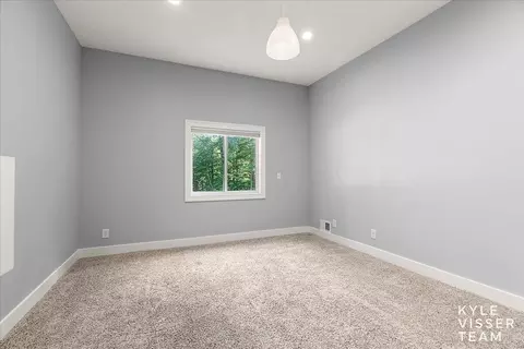 Bedroom - 7290 Knapp St NE, Ada, MI 49301 photo 7 of 8