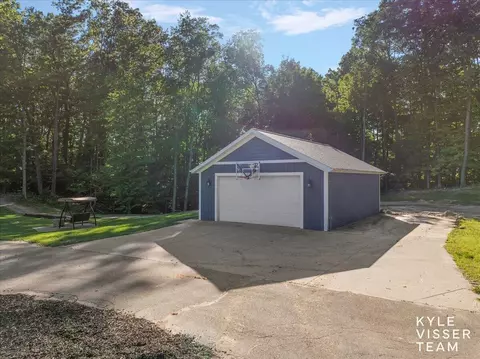 Exterior - 7290 Knapp St NE, Ada, MI 49301 photo 6 of 7
