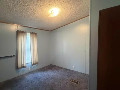 Bedroom - 1505 E Van Buren St, White Cloud, MI 49349 photo 2 of 3