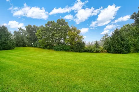 Exterior - 1239 Breezy Ln, Jackson, MI 49201 photo 6 of 14