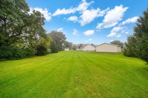 Exterior - 1239 Breezy Ln, Jackson, MI 49201 photo 7 of 14