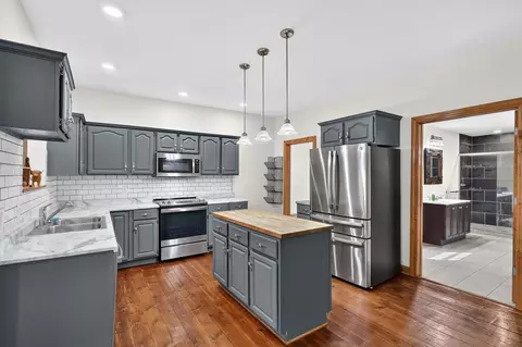 Kitchen - 323 E Main St, Maple Rapids, MI 48853 photo 2 of 5