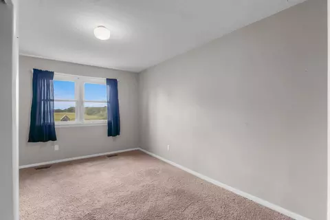 Bedroom - 3771 Reading Rd E, Osseo, MI 49266 photo 1 of 6