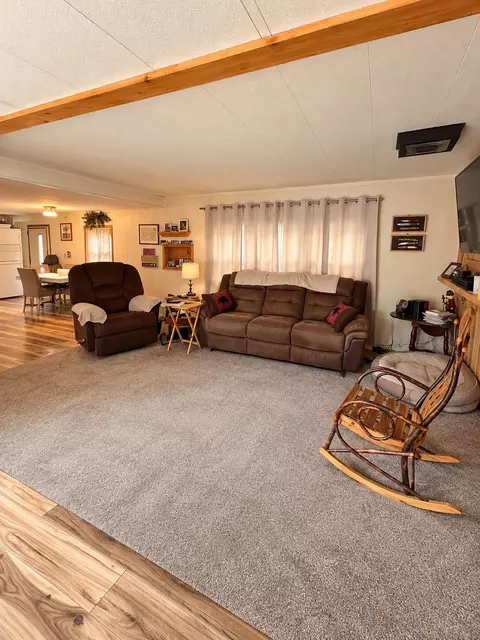 Living - 230 Maplewood Dr, Roscommon, MI 48653 photo 2 of 2
