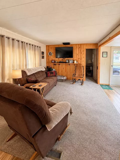 Living - 230 Maplewood Dr, Roscommon, MI 48653 photo 1 of 2