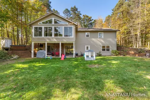 Exterior - 1440 Fero Ave NE, Lowell, MI 49331 photo 5 of 17
