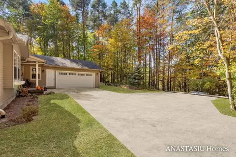 Exterior - 1440 Fero Ave NE, Lowell, MI 49331 photo 3 of 17
