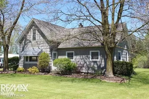 10176 Puttygut, Casco, MI 48064 photo 1
