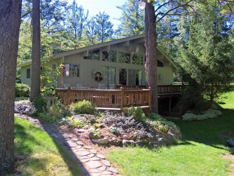 3640 Whispering Pnes, Gladwin, MI 48624 photo 1