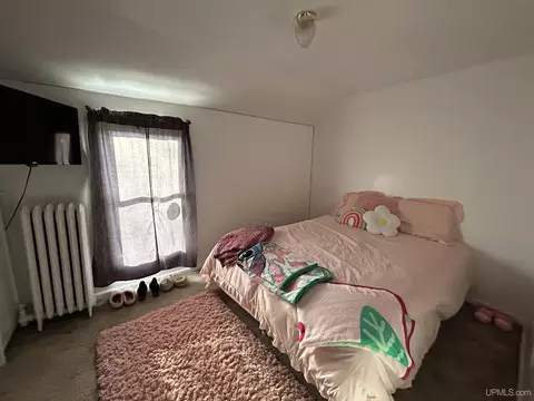 Bedroom - 220 W W Rdg, Ishpeming, MI 49849 photo 4 of 4
