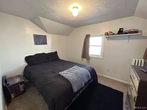 Bedroom - 220 W W Rdg, Ishpeming, MI 49849 photo 3 of 4