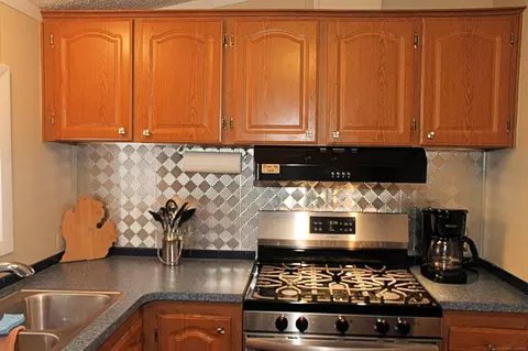 Kitchen - 2545 Lakeshore Rd #LOT 71, Applegate, MI 48401 photo 3 of 3
