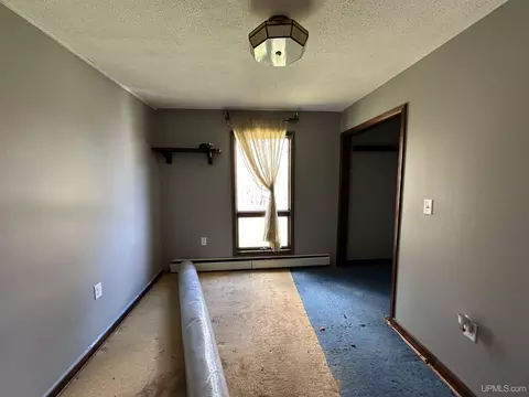 Bedroom - 6 Birch, Ishpeming, MI 49849 photo 2 of 3