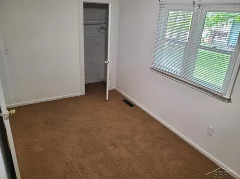 Bedroom - 8459 E Monroe Rd, Wheeler, MI 48662 photo 2 of 4