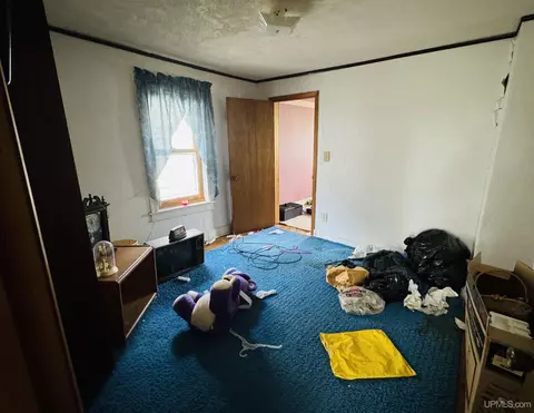 Bedroom - 406 S Third, Ishpeming, MI 49849 photo 2 of 2