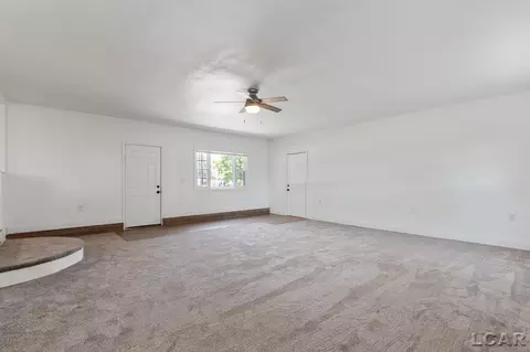 Living - 1130 Lowe, Adrian, MI 49221 photo 2 of 7