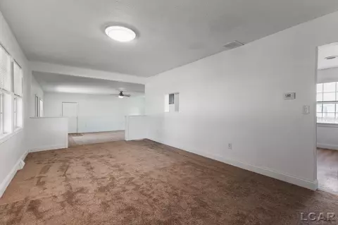 Living - 1130 Lowe, Adrian, MI 49221 photo 6 of 7