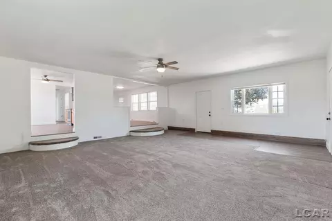 Living - 1130 Lowe, Adrian, MI 49221 photo 1 of 7