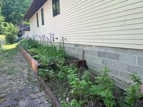 Exterior - 752 Rivers Ter, Gladwin, MI 48624 photo 7 of 11