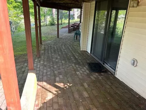 Exterior - 752 Rivers Ter, Gladwin, MI 48624 photo 5 of 11