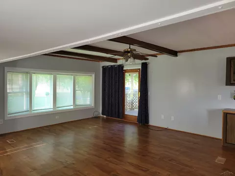 Living - 10790 E Wing, Shepherd, MI 48883 photo 2 of 4