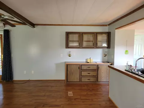 Living - 10790 E Wing, Shepherd, MI 48883 photo 3 of 4