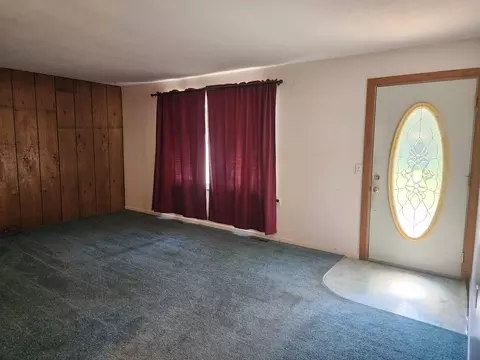 Living - 4572 N Elevator, Pinconning, MI 48650 photo 1 of 3