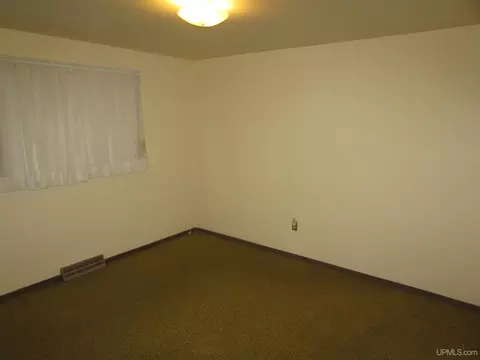 Bedroom - 22 Tuttle, L'anse, MI 49946 photo 1 of 4