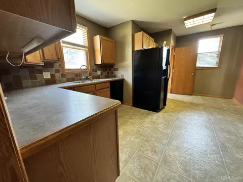Kitchen - 415 N 3rd, L'anse, MI 49946 photo 2 of 2