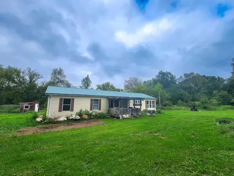 7266 N Eberhart, Harrison, MI 48625