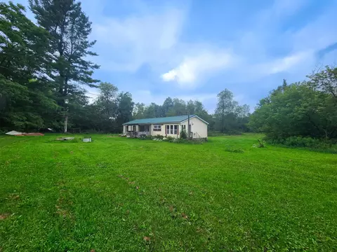 7266 N Eberhart, Harrison, MI 48625 photo 2