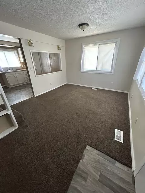 Living - 1374 Webber, Burton, MI 48529 photo 1 of 2