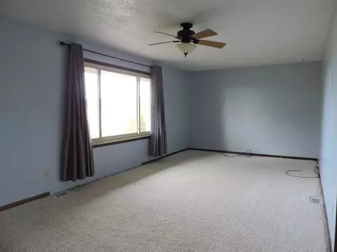Living - 1504 E Newberg, Pinconning, MI 48650 photo 2 of 3