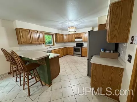 Kitchen - 4795 17th, Escanaba, MI 49829 photo 2 of 3