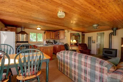 Living - 6037 Whippoorwill, Republic, MI 49879 photo 1 of 2