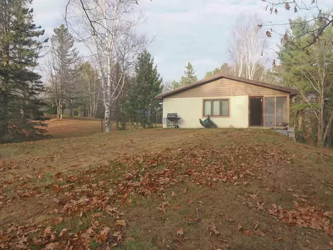 Exterior - 6037 Whippoorwill, Republic, MI 49879 photo 5 of 33