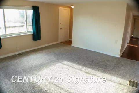 Living - 6893 E Baseline, Mount Pleasant, MI 48858 photo 1 of 2