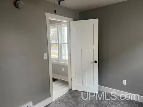 Bedroom - 407 S 9th, Escanaba, MI 49829 photo 1 of 8