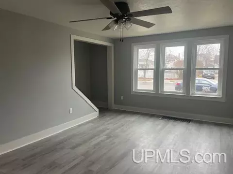Living - 407 S 9th, Escanaba, MI 49829 photo 2 of 3