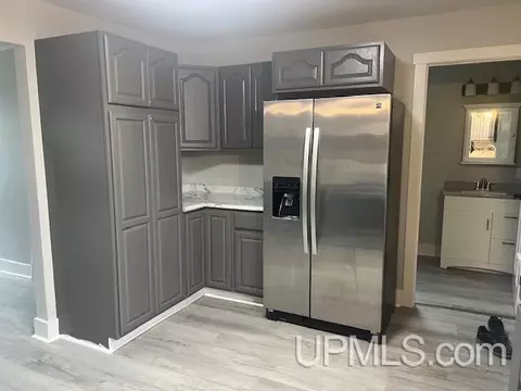 Kitchen - 407 S 9th, Escanaba, MI 49829 photo 2 of 2