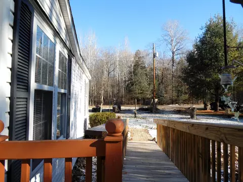 Exterior - 1543 N Cedar Riv, Gladwin, MI 48624 photo 4 of 15