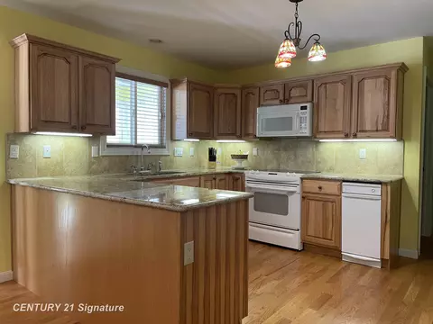Kitchen - 8585 N Mckinley, Flushing, MI 48433 photo 3 of 4