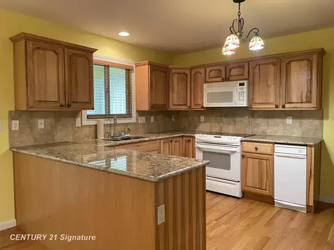 Kitchen - 8585 N Mckinley, Flushing, MI 48433 photo 2 of 4