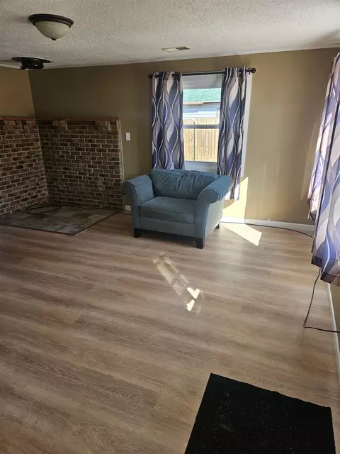 Living - 4193 E Oakley, Harrison, MI 48625 photo 2 of 2