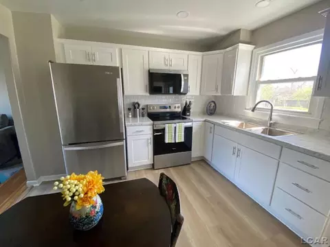Kitchen - 1127 W Maumee, Adrian, MI 49221 photo 1 of 2