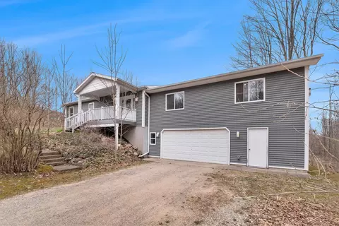 6933 Cram, Williamsburg, MI 49690